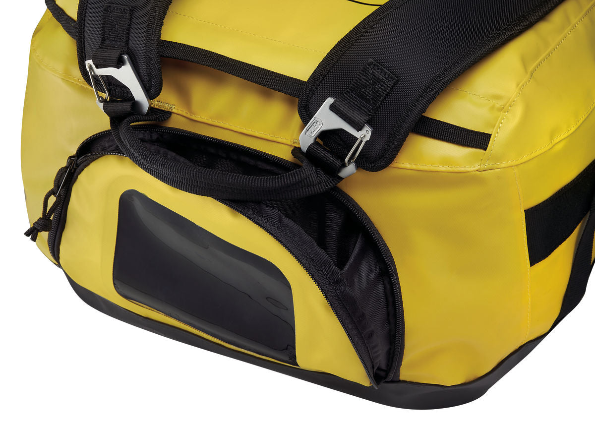Black and yellow Petzl Duffel 65L backpack.