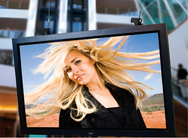 Adaptive Technologies Group HoverPro rigging flying a large flat screen display from overhead in a building atrium