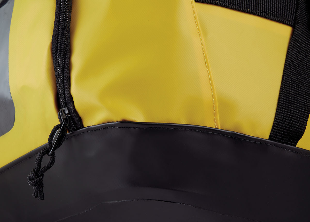 Black and yellow Petzl Duffel 65L backpack.